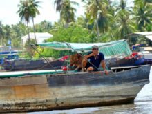 fishermann boot mekong delta vietnam