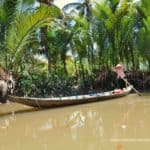 frau-rudert-boot-mekong-delta-vietnam